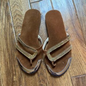 Gold flip flops